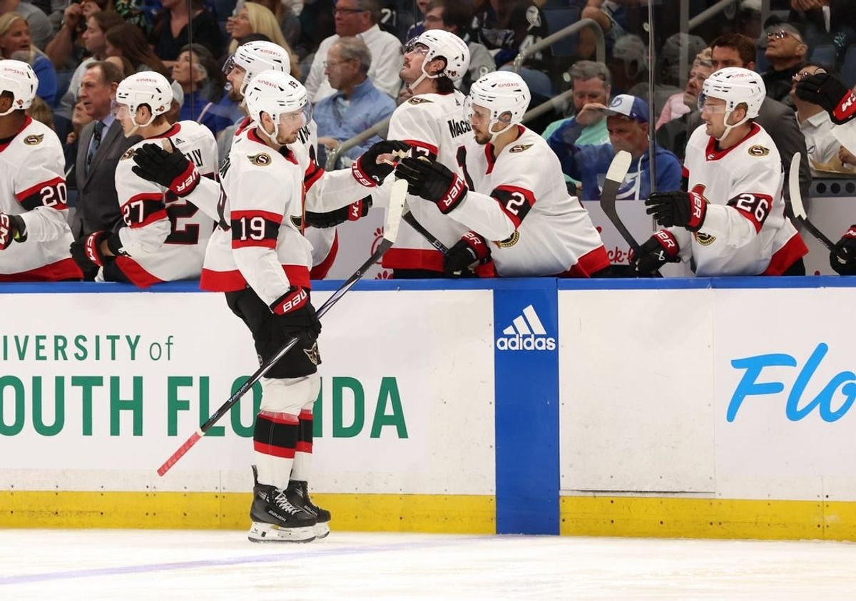 Apr 11, 2024; Tampa, Florida, USA; Ottawa Senators right wing Drake Batherson (19) is congratulated after he scored a goal against the Tampa Bay Lightning during the third period at Amalie Arena.
