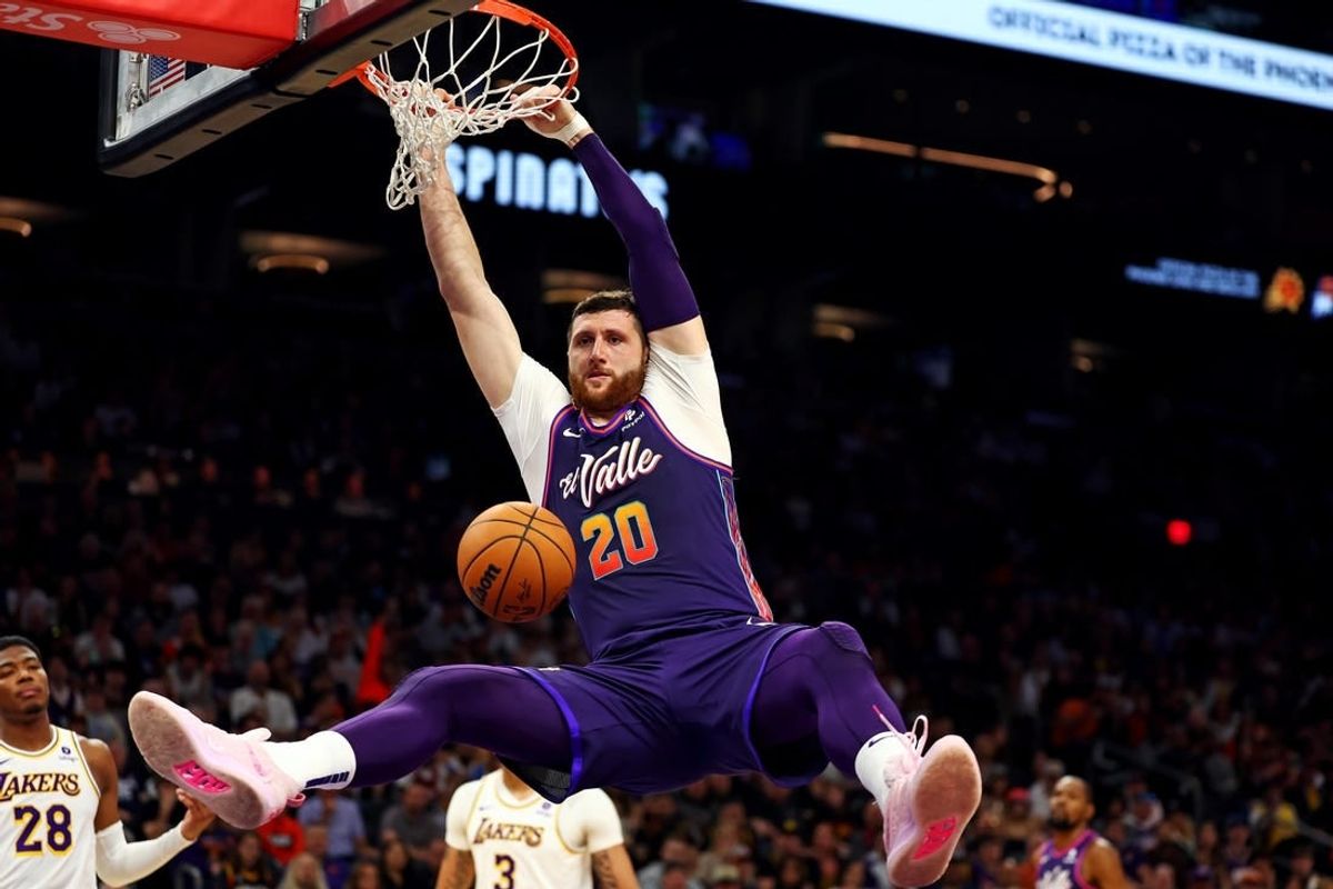 Feb 25, 2024; Phoenix, Arizona, USA; Phoenix Suns center Jusuf Nurkic (20) dunks the ball during the second quarter of the game against the Los Angeles Lakers at Footprint Center.