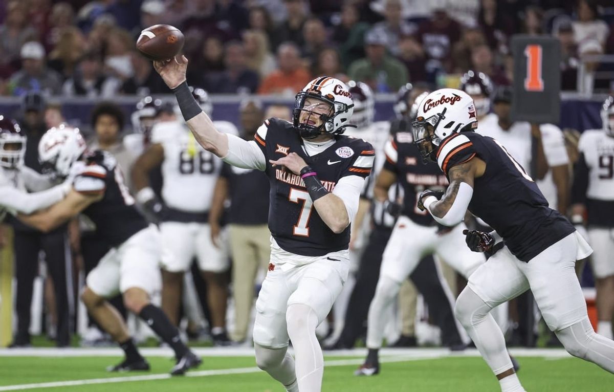 Dec 27, 2023; Houston, TX, USA; Oklahoma State Cowboys quarterback Alan Bowman (7) attempts a pass during the first quarter against the Texas A&M Aggies at NRG Stadium.