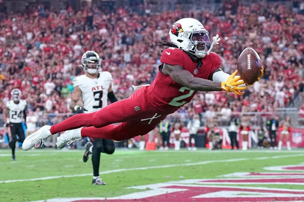 Nov 12, 2023; Glendale, Arizona, USA; Arizona Cardinals wide receiver Marquise Brown (2) reaches for a pass against the Atlanta Falcons during the first half at State Farm Stadium.
