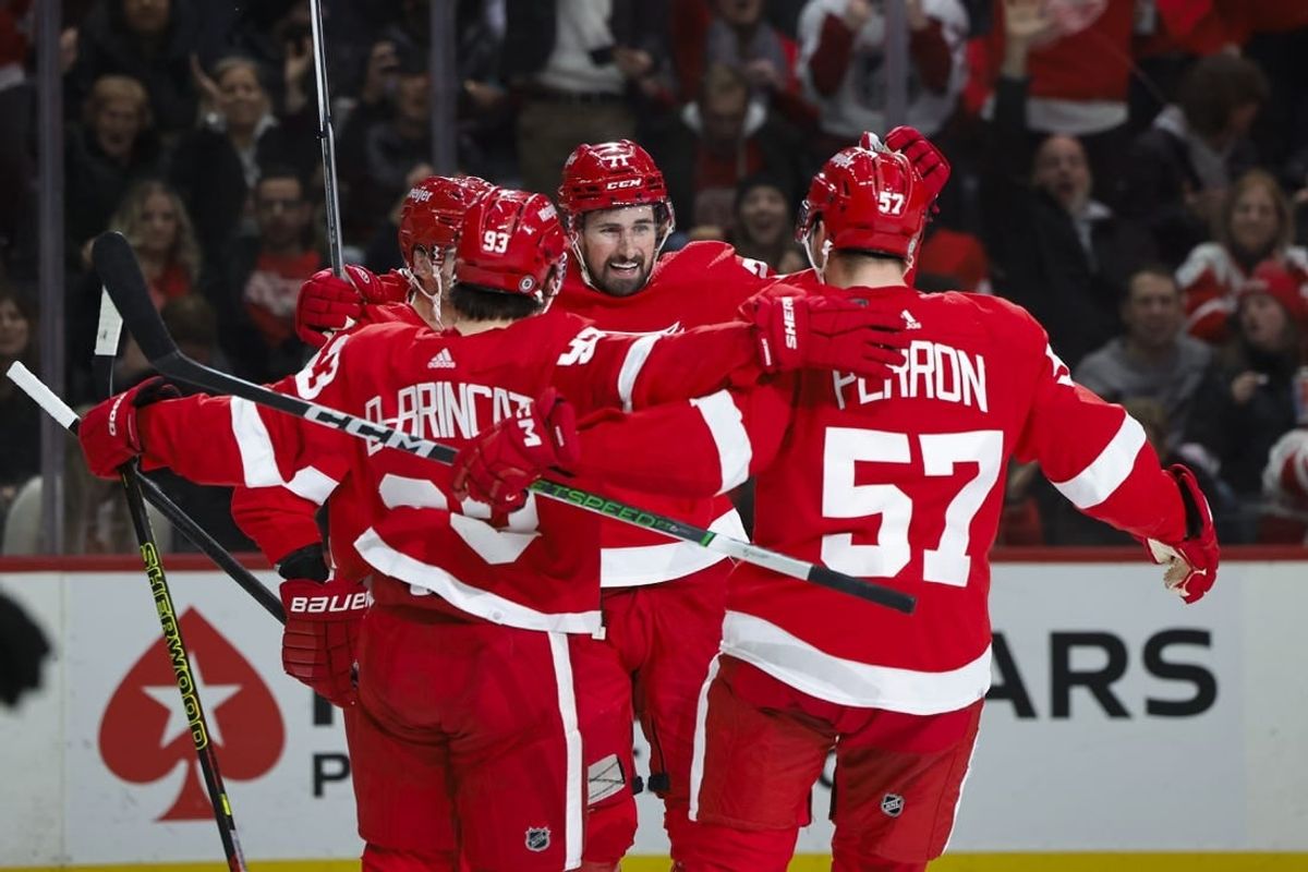 Jan 13, 2024; Detroit, Michigan, USA;  Detroit Red Wings center Dylan Larkin (71) celebrates after he scores a goal on Los Angeles Kings goaltender Cam Talbot (39) in the second period at Little Caesars Arena.