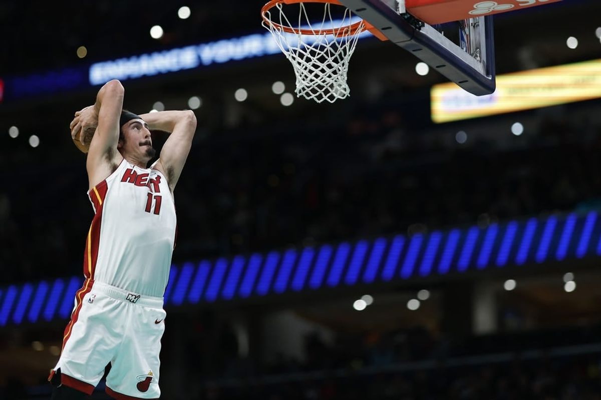 Feb 2, 2024; Washington, District of Columbia, USA; Miami Heat guard Jaime Jaquez Jr. (11) dunks the ball against the Washington Wizards in the first half at Capital One Arena.