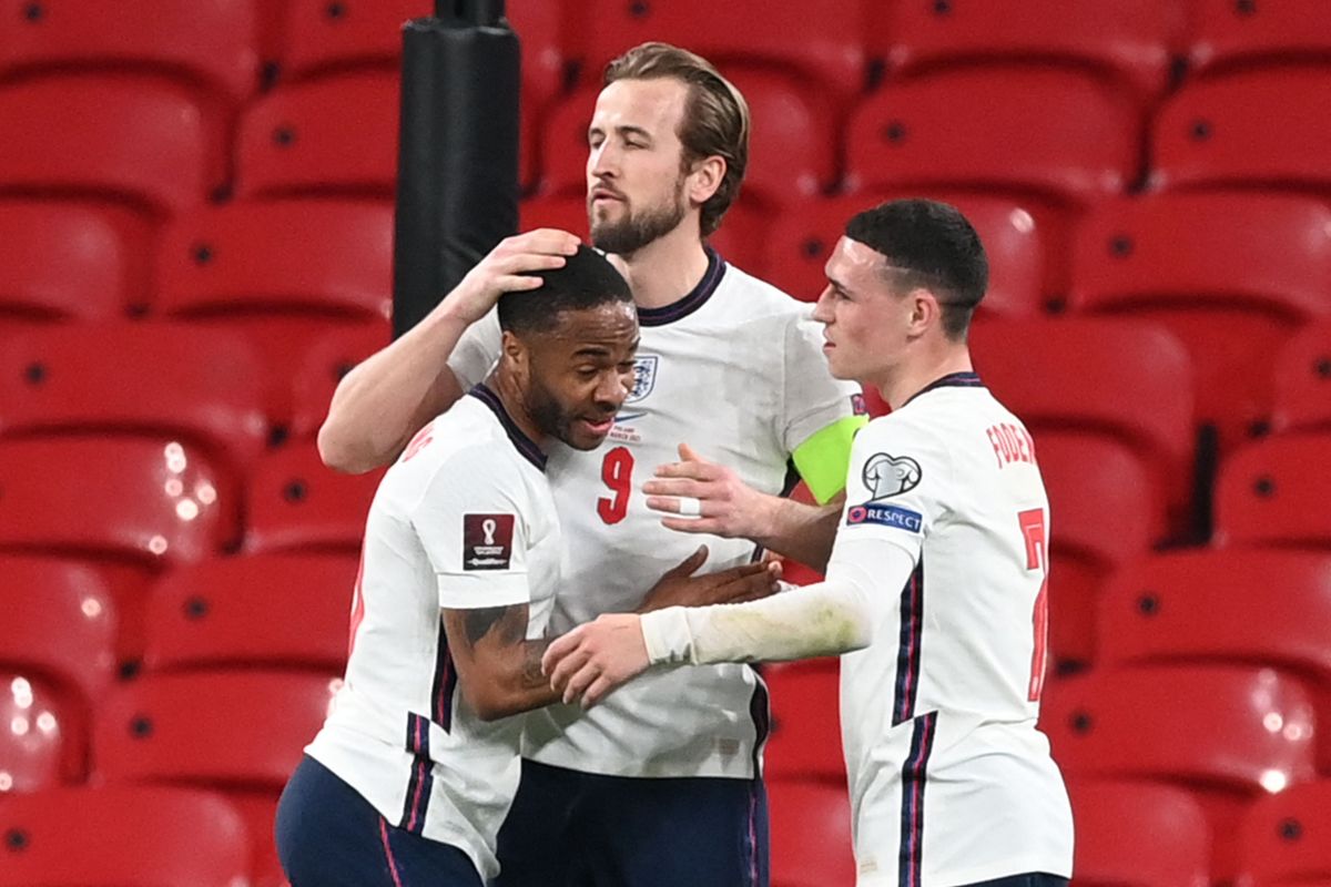 England’s striker Harry Kane (c.)celebrates with Phil Foden (r.) and Raheem Sterling after scoring the opening goal during the FIFA World Cup qualifier in March. What will Euro 2021 bring the trio?