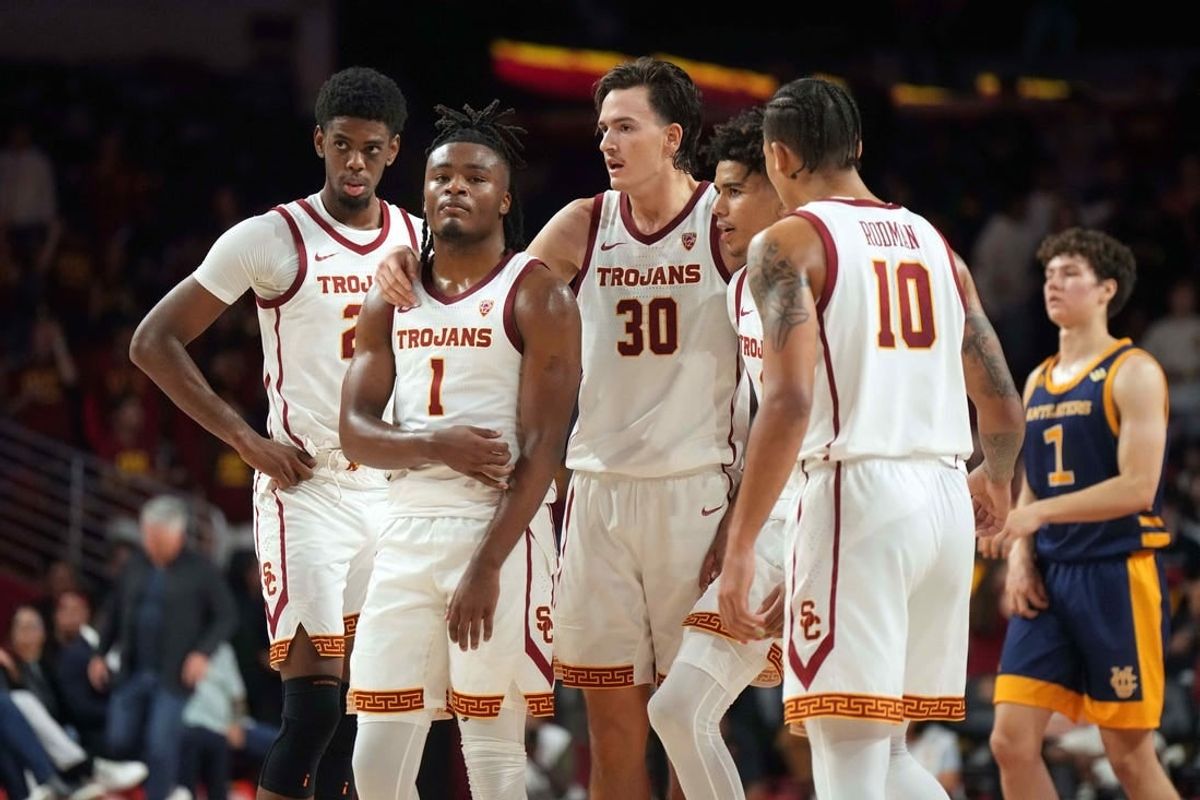 Nov 14, 2023; Los Angeles, California, USA; Southern California Trojans forward Joshua Morgan (24), guard Isaiah Collier (1), forward Harrison Hornery (30), guard Oziyah Sellers (4) and forward DJ Rodman (10) react in the second half against the UC Irvine Anteaters at Galen Center.