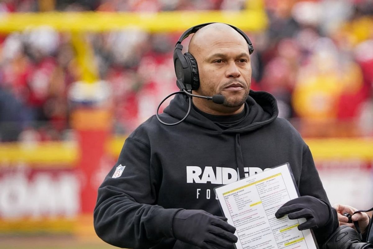 Dec 25, 2023; Kansas City, Missouri, USA; Las Vegas Raiders interim head coach Antonio Pierce on field against the Kansas City Chiefs during the first half at GEHA Field at Arrowhead Stadium.