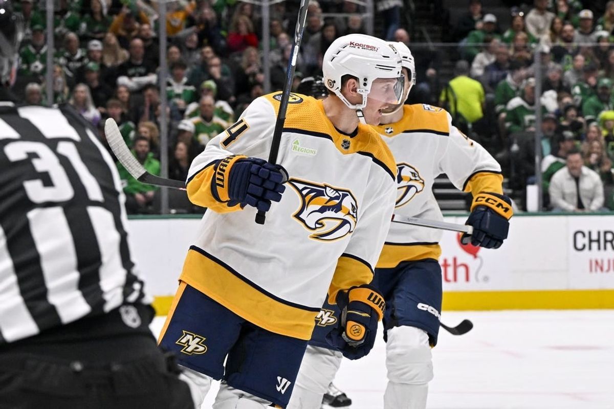 Jan 6, 2024; Dallas, Texas, USA; Nashville Predators center Gustav Nyquist (14) celebrates after scoring a goal against the Dallas Stars during the first period at the American Airlines Center.