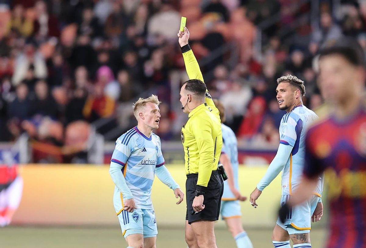 Mar 9, 2024; Sandy, Utah, USA; Colorado Rapids midfielder Jasper Loffelsend (21) receives a yellow card in the second half against Real Salt Lake at America First Field.