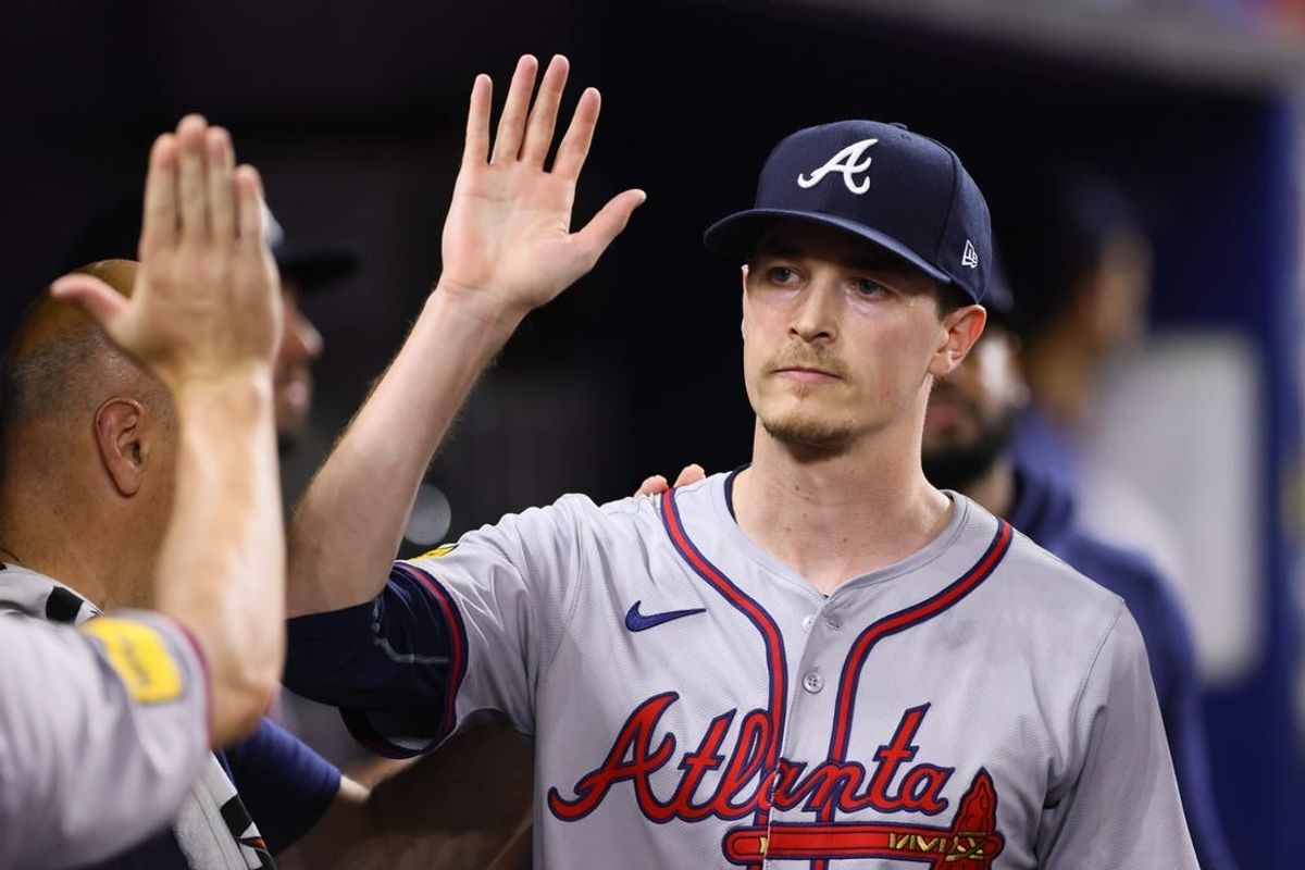 Apr 12, 2024; Miami, Florida, USA; Atlanta Braves starting pitcher Max Fried (54) celebrates with teammates against the Miami Marlins during the seventh inning at loanDepot Park.