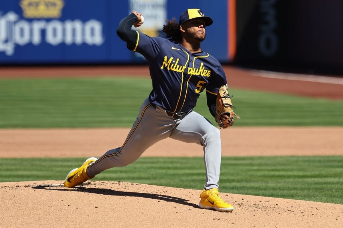 Mar 29, 2024; New York City, New York, USA; Milwaukee Brewers starting pitcher Freddy Peralta (51) delivers a pitch  during the first inning against the New York Mets at Citi Field.
