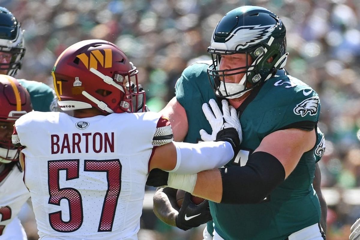 Oct 1, 2023; Philadelphia, Pennsylvania, USA; Philadelphia Eagles center Cam Jurgens (51) blocks Washington Commanders linebacker Cody Barton (57) at Lincoln Financial Field.