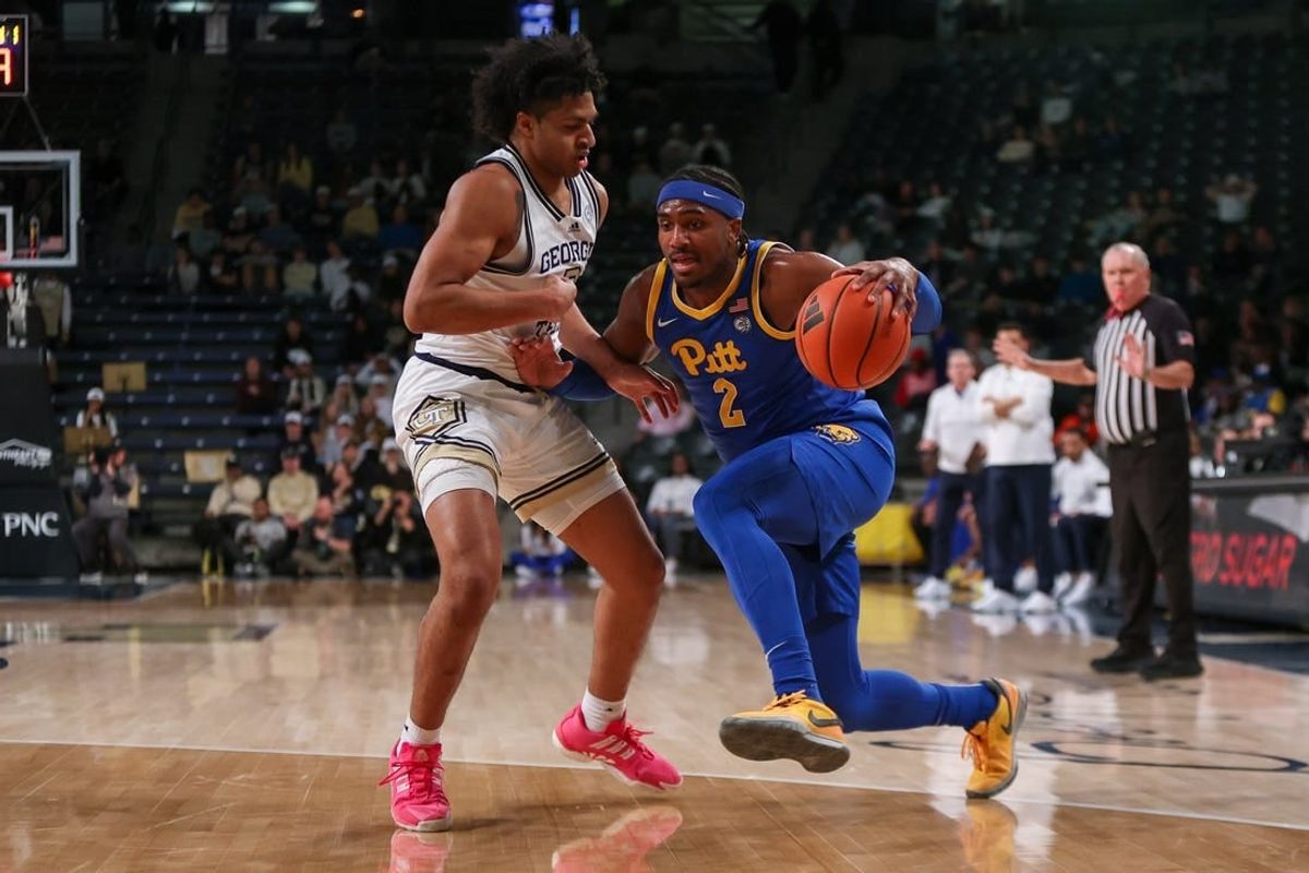 Jan 23, 2024; Atlanta, Georgia, USA; Pittsburgh Panthers forward Blake Hinson (2) is defended by Georgia Tech Yellow Jackets guard Dallan Coleman (3) in the first half at McCamish Pavilion.