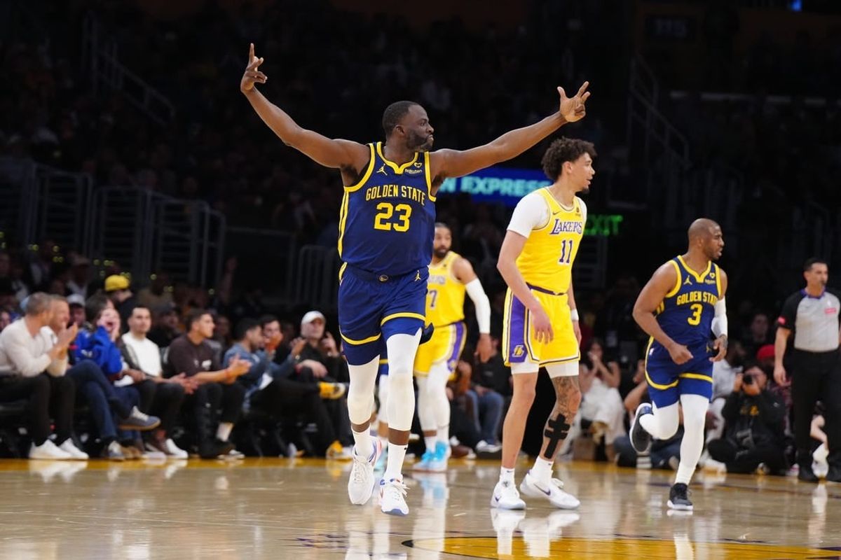 Apr 9, 2024; Los Angeles, California, USA; Golden State Warriors forward Draymond Green (23) celebrates in the first half against the Los Angeles Lakers at Crypto.com Arena.