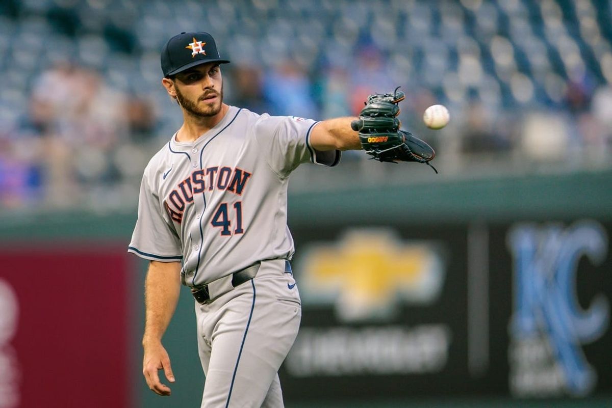 Apr 10, 2024; Kansas City, Missouri, USA; Houston Astros pitcher Spencer Arrighetti (41) reaches for a throw from first during the first inning against the Kansas City Royals at Kauffman Stadium.