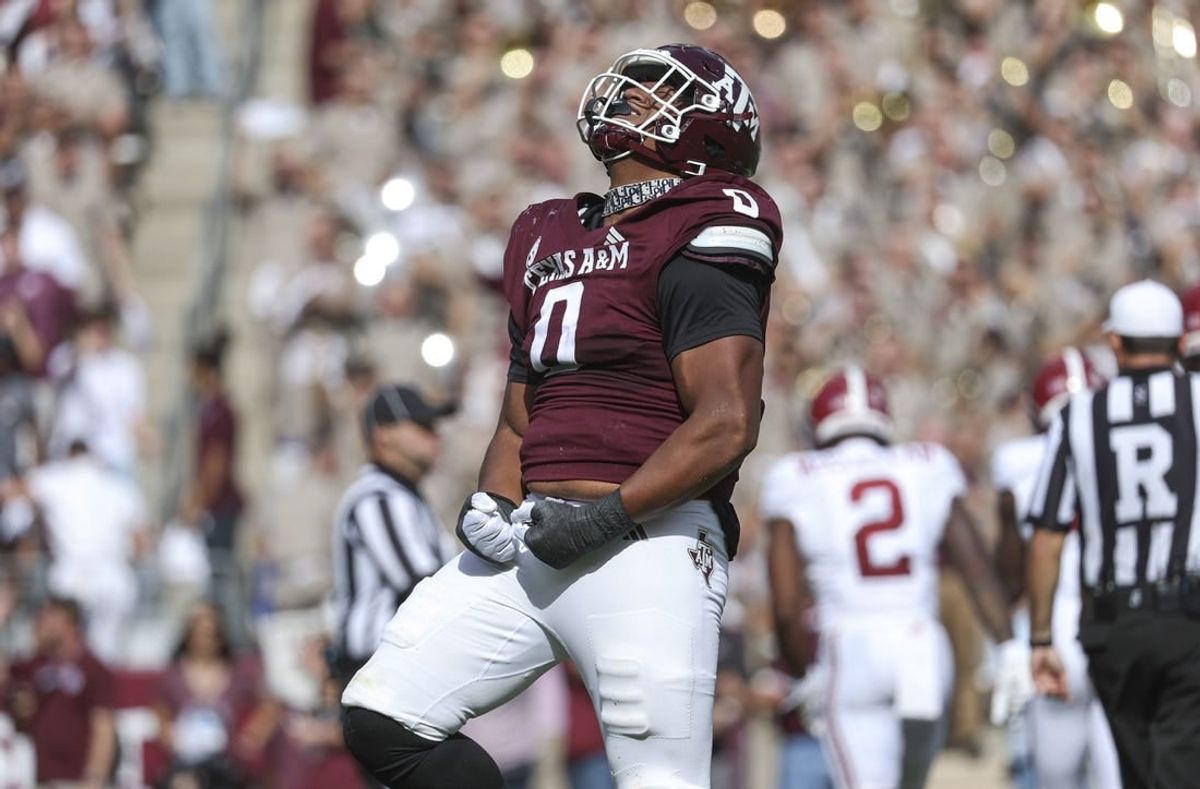 Oct 7, 2023; College Station, Texas, USA; Texas A&M Aggies defensive lineman Walter Nolen (0) reacts after a play during the second quarter against the Alabama Crimson Tide at Kyle Field.