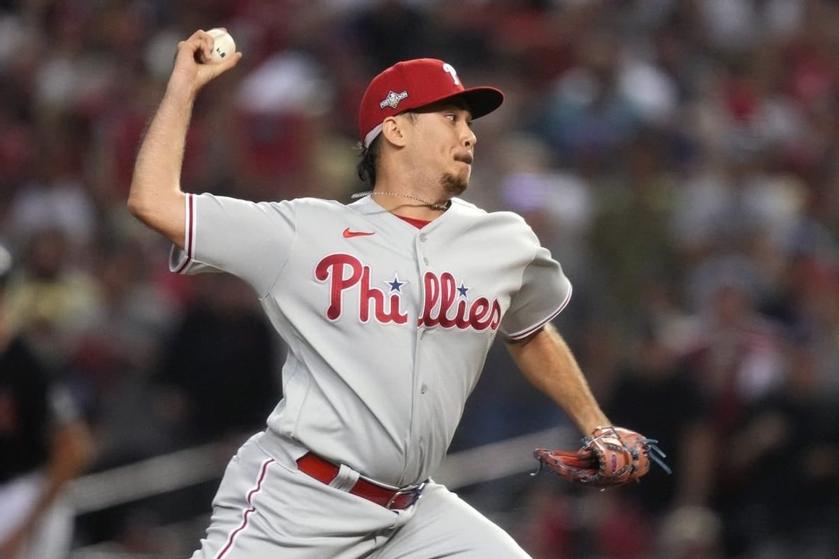 Philadelphia Phillies relief pitcher Orion Kerkering (50) throws a pitch against the Arizona Diamondbacks during the seventh inning in Game 5 of the NLCS of the 2023 MLB playoffs at Chase Field in Phoenix on Oct. 20, 2023.