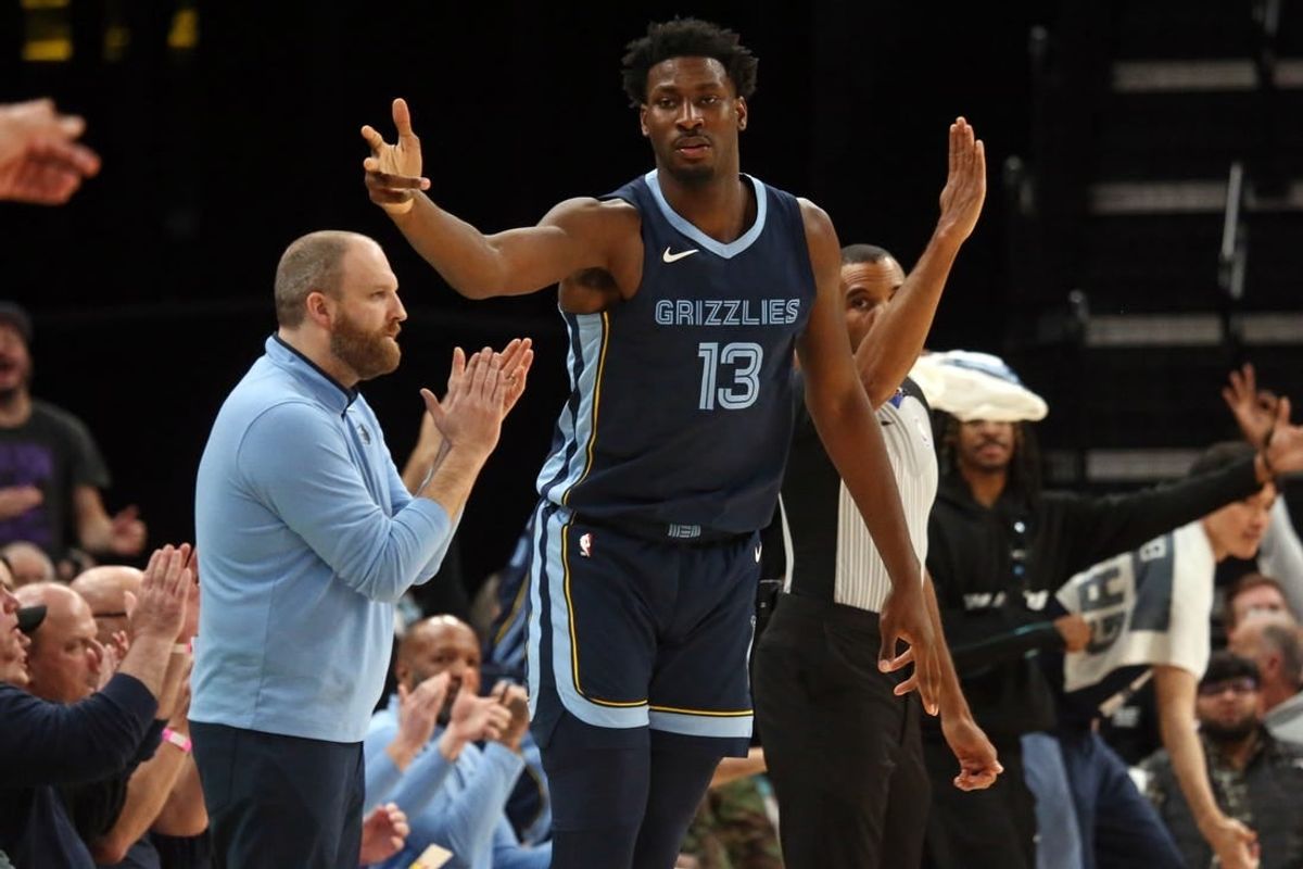 Feb 14, 2024; Memphis, Tennessee, USA; Memphis Grizzlies forward-center Jaren Jackson Jr. (13) reacts after a three-point basket during the second half against the Houston Rockets at FedExForum.