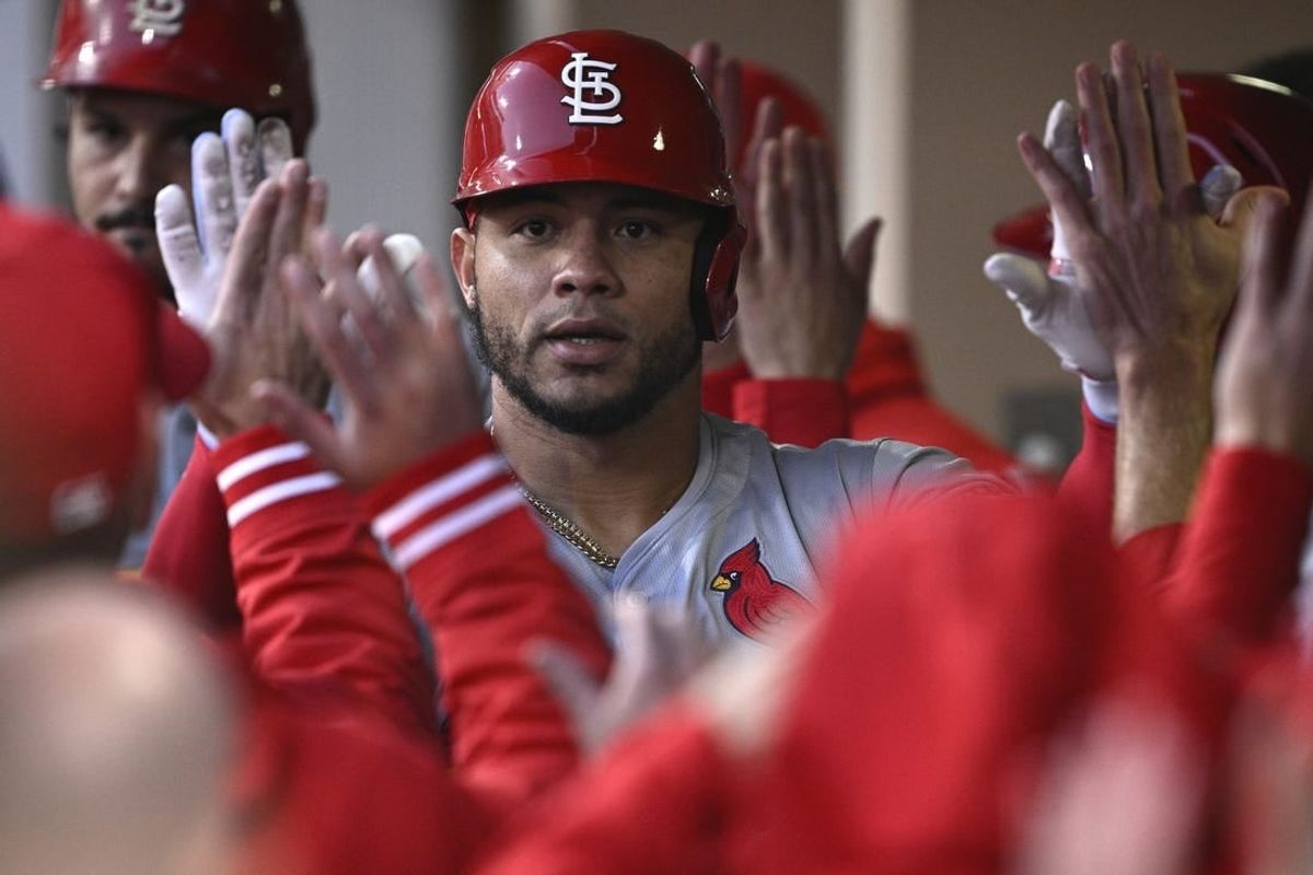 Apr 1, 2024; San Diego, California, USA; St. Louis Cardinals catcher Willson Contreras (40) is congratulated in the dugout after hitting a two-run home run against the San Diego Padres during the first inning at Petco Park.