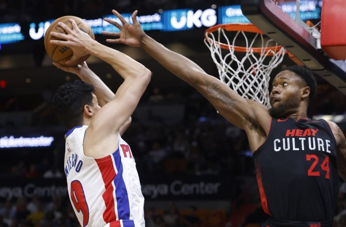Mar 5, 2024; Miami, Florida, USA; Miami Heat forward Haywood Highsmith (24) defends Detroit Pistons forward Simone Fontecchio (19) during the first half at Kaseya Center.