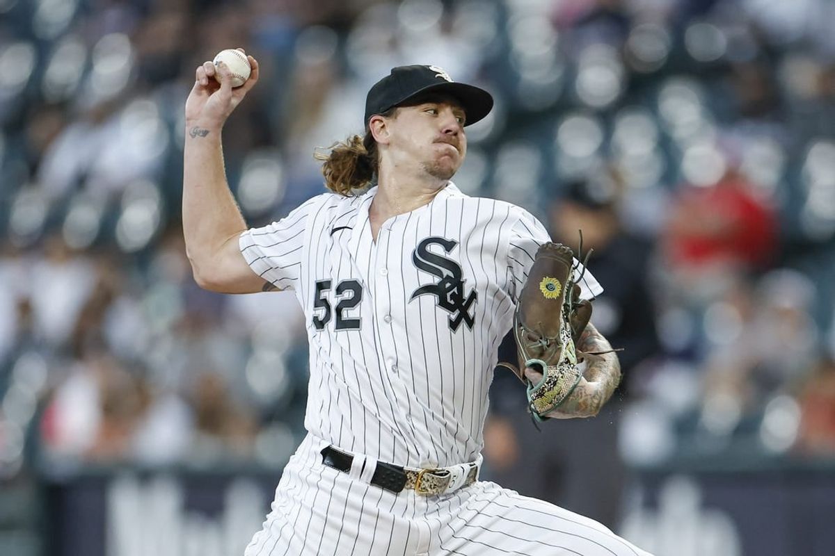 Sep 30, 2023; Chicago, Illinois, USA; Chicago White Sox starting pitcher Mike Clevinger (52) delivers a pitch against the San Diego Padres during the first inning at Guaranteed Rate Field.