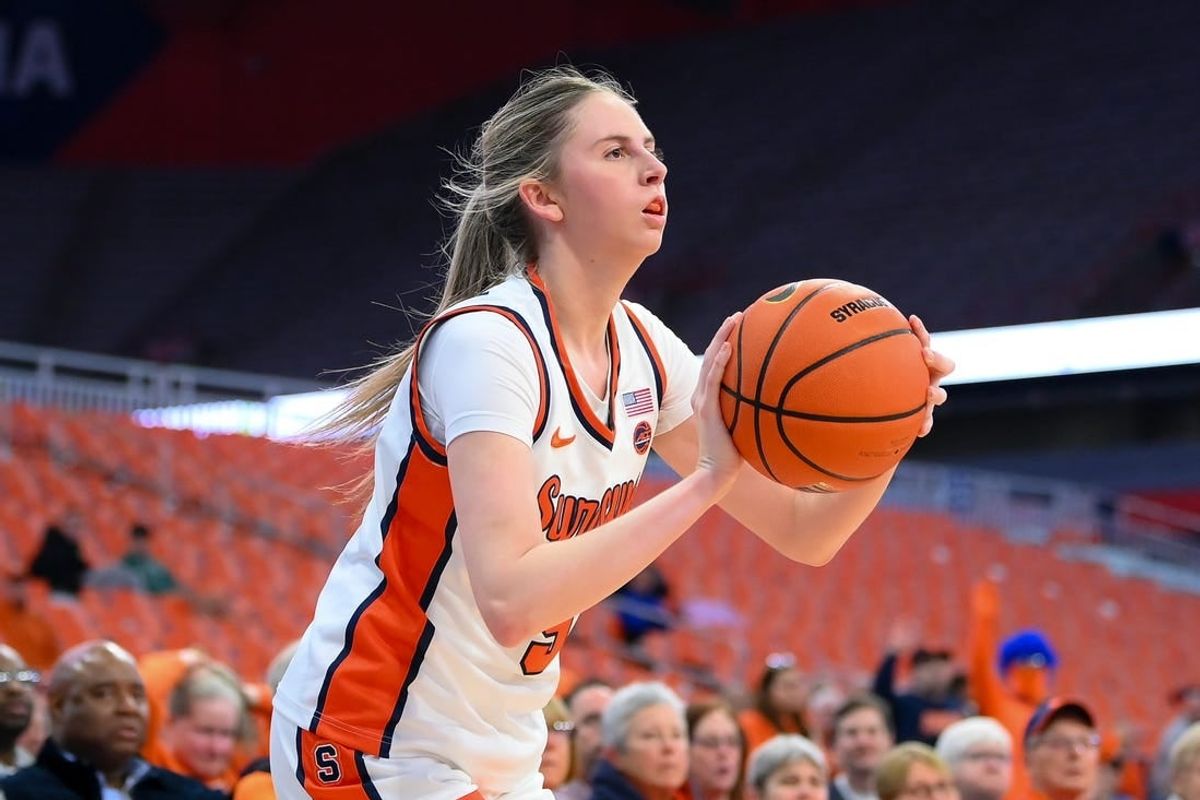 Nov 30, 2023; Syracuse, New York, USA; Syracuse Orange guard Georgia Woolley (5) shoots the ball against the Alabama Crimson Tide during the first half at the JMA Wireless Dome.