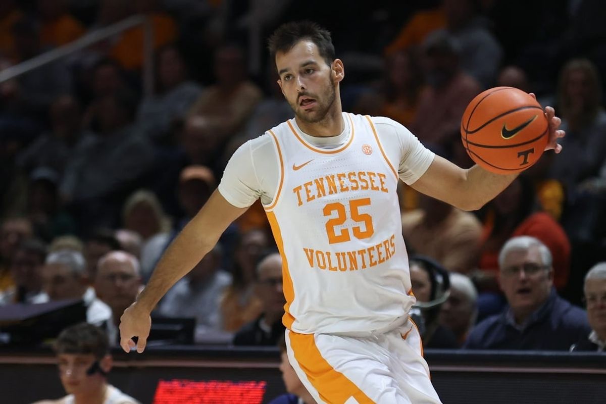 Dec 12, 2023; Knoxville, Tennessee, USA; Tennessee Volunteers guard Santiago Vescovi (25) brings the ball up court against the Georgia Southern Eagles during the first half at Food City Center at Thompson-Boling Arena.