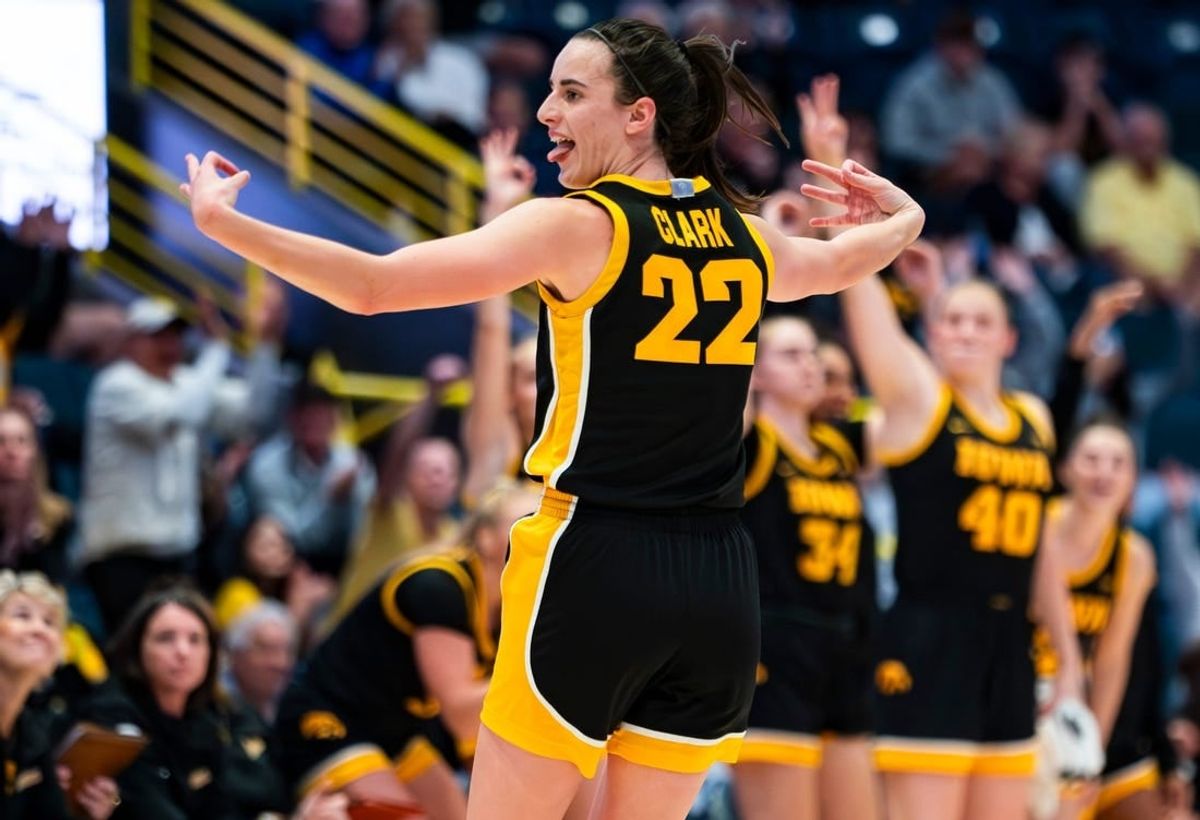 Iowa Hawkeyes guard Caitlin Clark (22) celebrates a three-point basket during the third quarter of the Gulf Coast Showcase championship game against the Kansas State Wildcats at Hertz Arena in Estero on Sunday, Nov. 26, 2023.