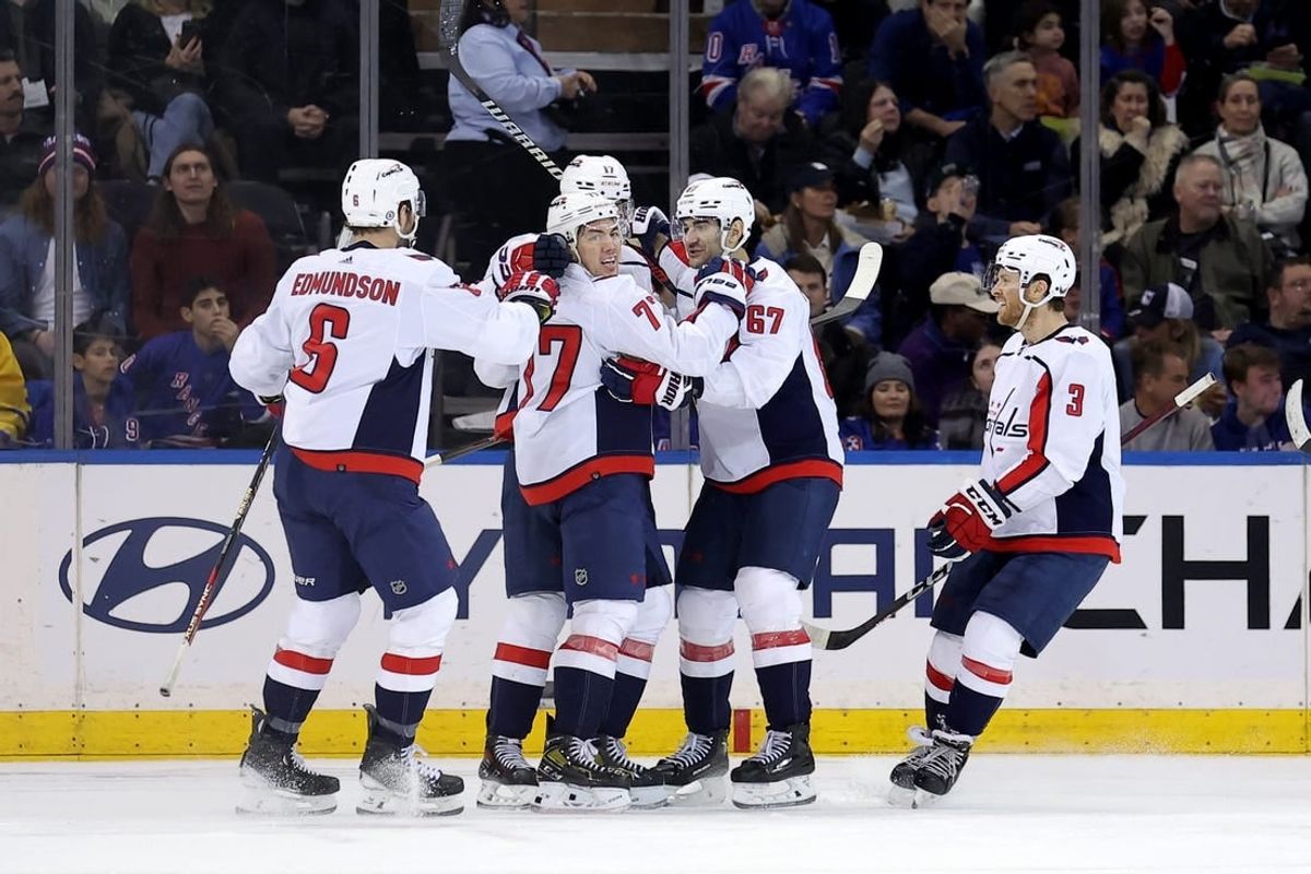 Jan 14, 2024; New York, New York, USA; Washington Capitals right wing T.J. Oshie (77) celebrates his goal against the New York Rangers with teammates during the second period at Madison Square Garden.