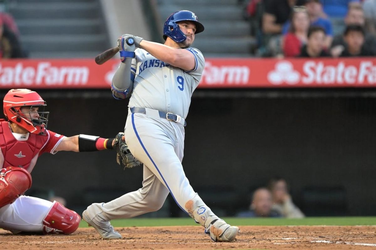 May 9, 2024; Anaheim, California, USA;  Kansas City Royals first baseman Vinnie Pasquantino (9) follows through on a two-run home run against the Los Angeles Angels in the third inning at Angel Stadium.