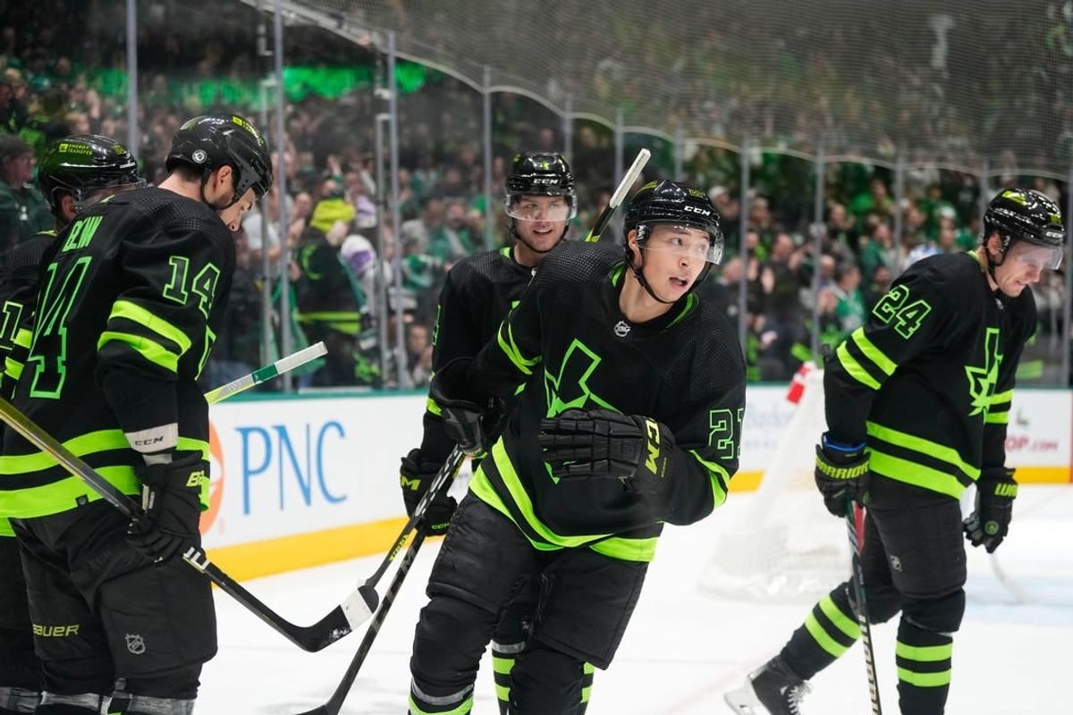 Dec 2, 2023; Dallas, Texas, USA; Dallas Stars left wing Jason Robertson (21) celebrates with teammates after scoring a goal against the Tampa Bay Lightning during the second period at American Airlines Center.
