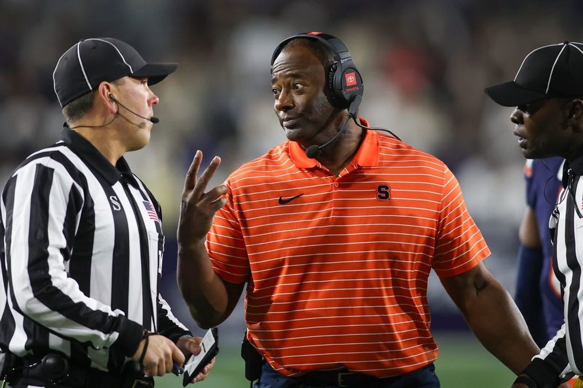 Nov 18, 2023; Atlanta, Georgia, USA; Syracuse Orange head coach Dino Babers talks to a referee against the Georgia Tech Yellow Jackets in the first half at Bobby Dodd Stadium at Hyundai Field.
