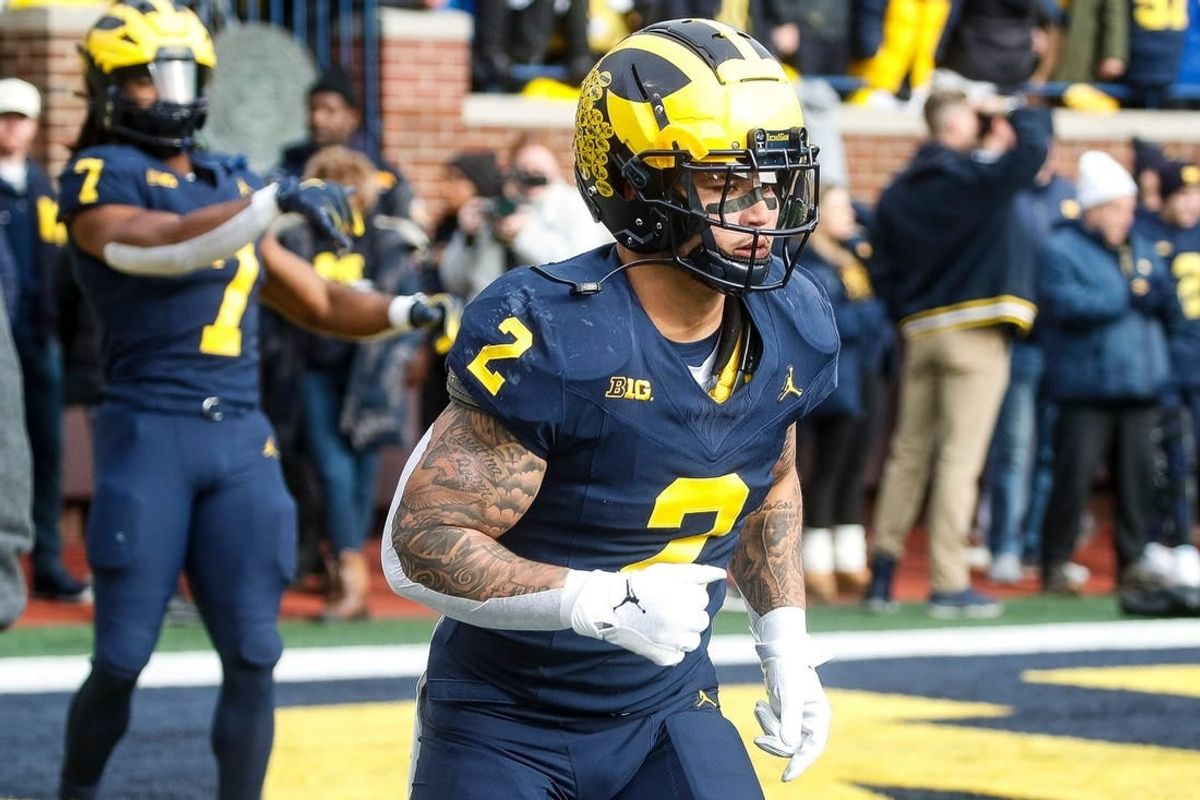 Michigan running back Blake Corum warms up before the Ohio State game at Michigan Stadium in Ann Arbor on Saturday, Nov. 25, 2023.
