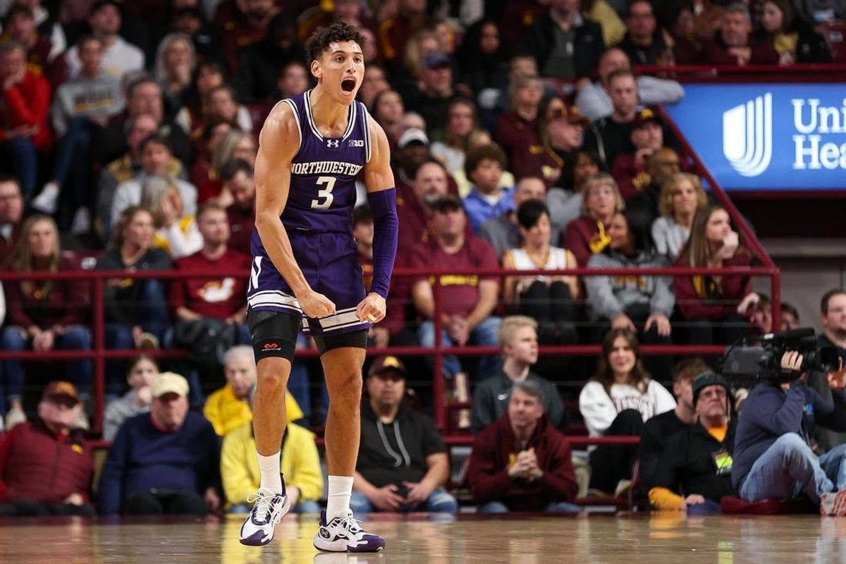 Feb 3, 2024; Minneapolis, Minnesota, USA; Northwestern Wildcats guard Ty Berry (3) celebrates his three-point basket against the Minnesota Golden Gophers during the first half at Williams Arena.
