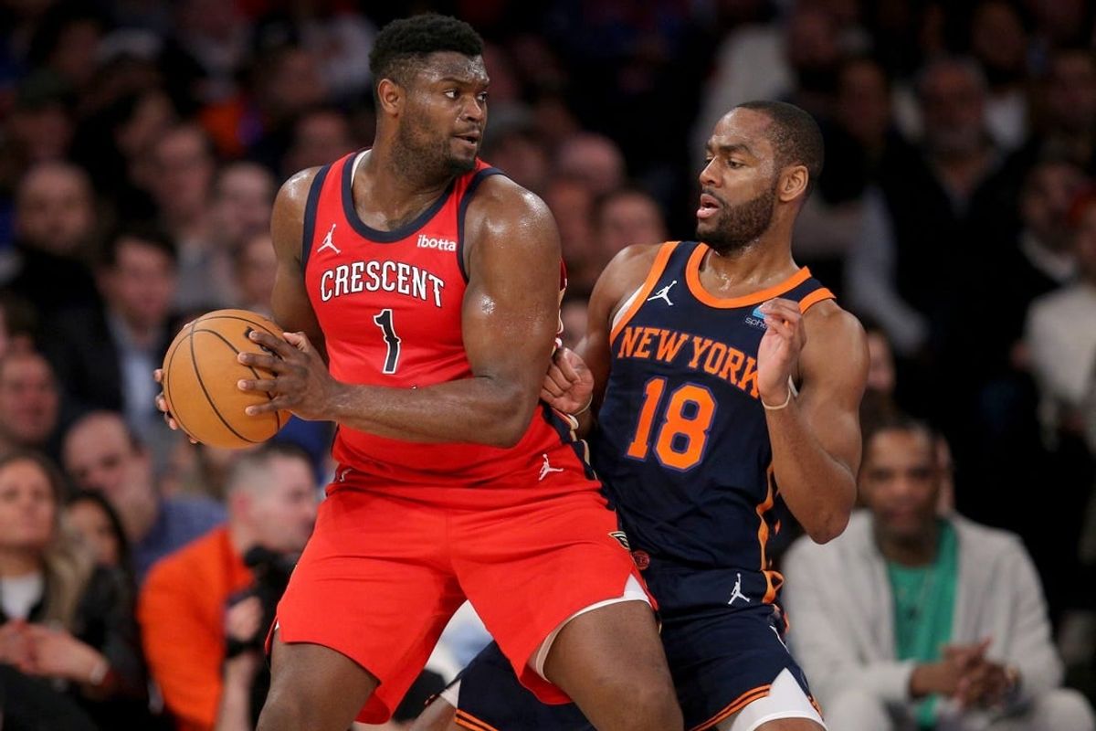 Feb 27, 2024; New York, New York, USA; New Orleans Pelicans forward Zion Williamson (1) controls the ball against New York Knicks guard Alec Burks (18) during the second quarter at Madison Square Garden.