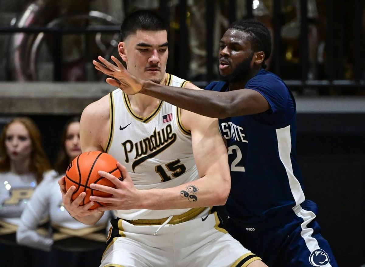 Jan 13, 2024; West Lafayette, Indiana, USA; Purdue Boilermakers center Zach Edey (15) controls the ball against Penn State Nittany Lions forward Qudus Wahab (22) during the first half at Mackey Arena.
