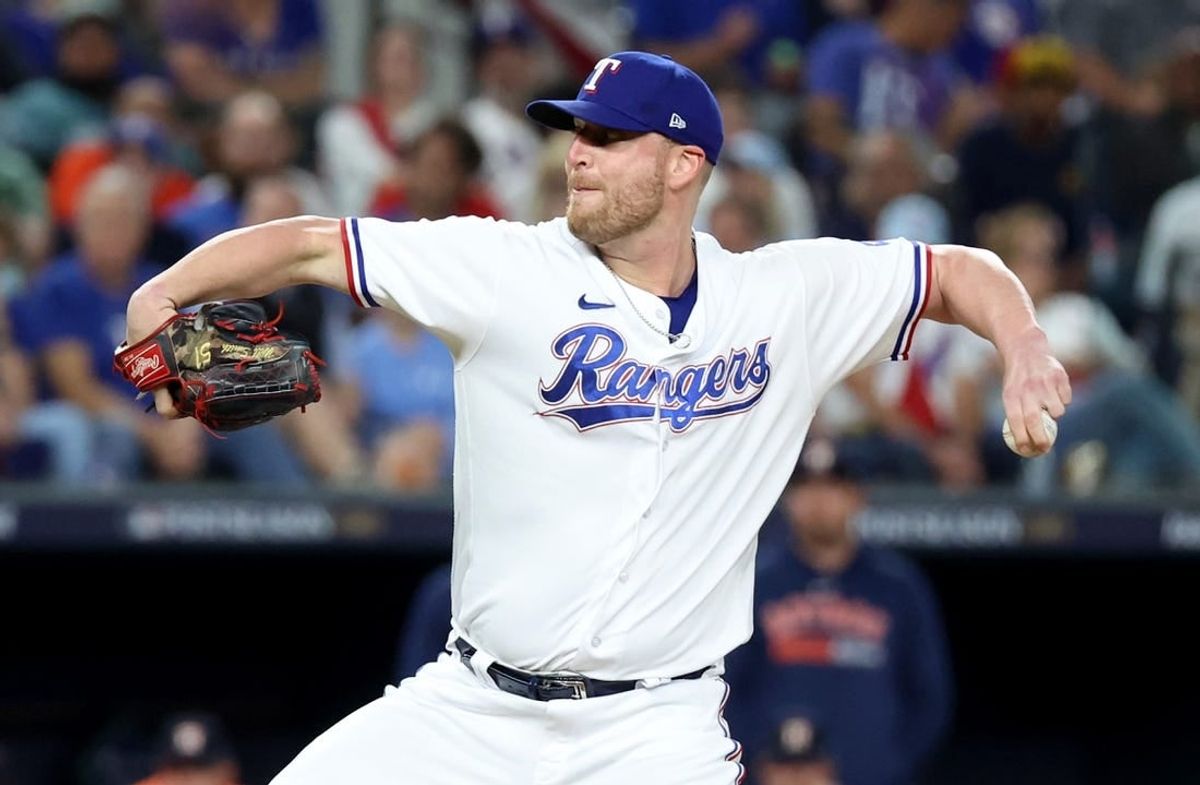 Oct 18, 2023; Arlington, Texas, USA; Texas Rangers pitcher Will Smith (51) throws during the seventh inning of game three of the ALCS against the Houston Astros in the 2023 MLB playoffs at Globe Life Field.