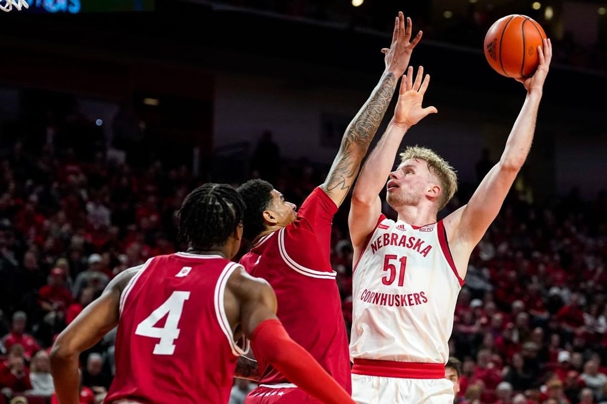 Jan 3, 2024; Lincoln, Nebraska, USA; Nebraska Cornhuskers forward Rienk Mast (51) shoots the ball against Indiana Hoosiers center Kel'el Ware (1) and forward Anthony Walker (4) during the first half at Pinnacle Bank Arena.