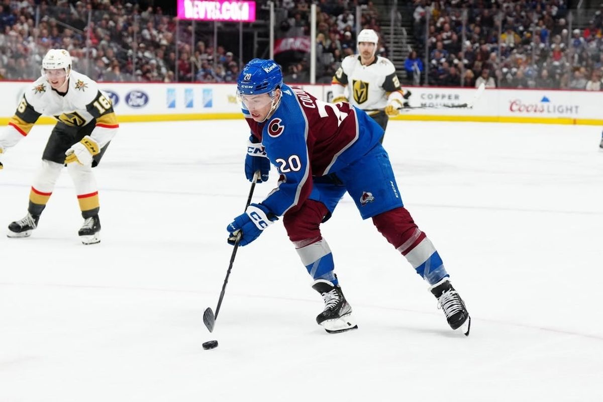 Jan 10, 2024; Denver, Colorado, USA; Colorado Avalanche center Ross Colton (20) controls the puck in the second period against the Vegas Golden Knights at Ball Arena.
