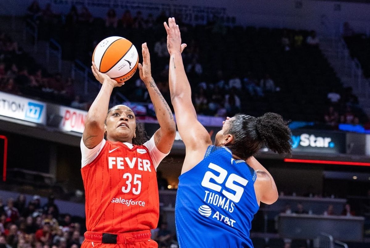 May 19, 2023; Indianapolis, Indiana, USA; Indiana Fever guard Victoria Vivians (35) shoots the ball while Connecticut Sun forward Alyssa Thomas (25) defends in the second half at Gainbridge Fieldhouse.