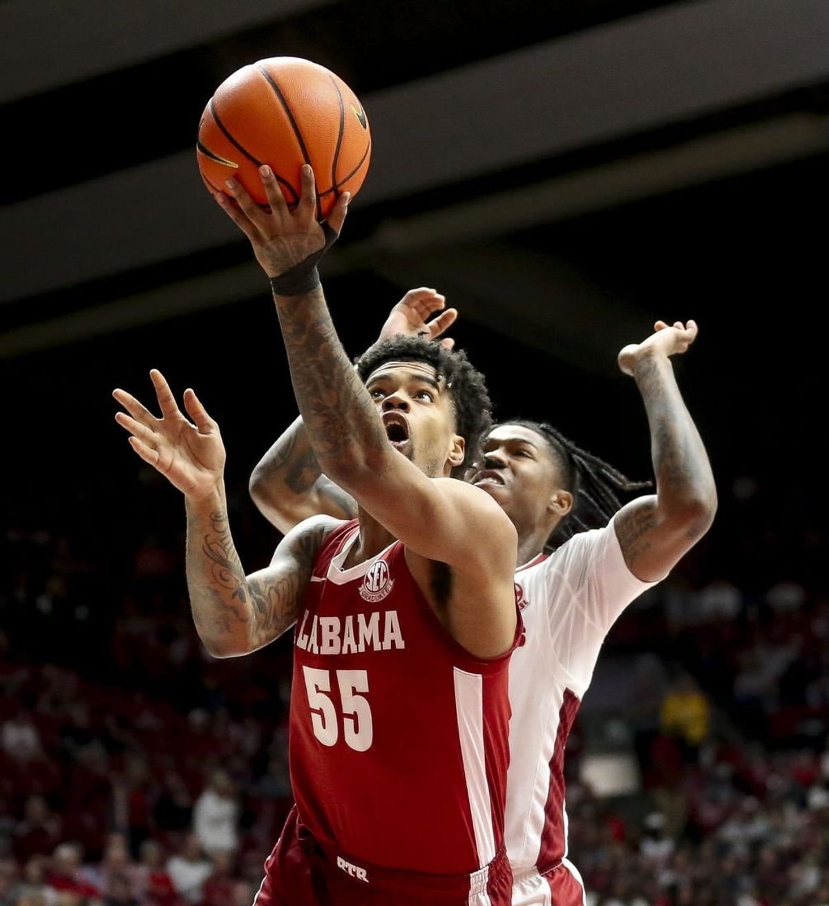 Mar 9, 2024; Tuscaloosa, Alabama, USA;  Alabama Crimson Tide guard Aaron Estrada goes to the hoop against Arkansas Razorbacks at Coleman Coliseum.
