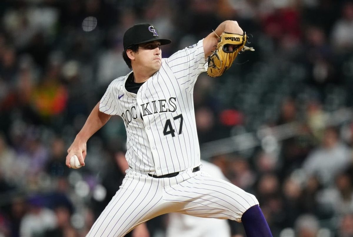 Apr 9, 2024; Denver, Colorado, USA; Colorado Rockies starting pitcher Cal Quantrill (47) delivers a pitch in the fifth inning against the Arizona Diamondbacks at Coors Field.