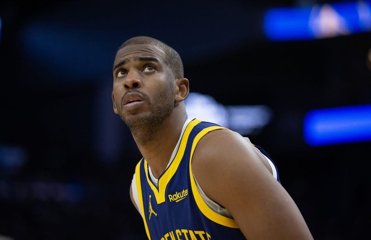 Dec 30, 2023; San Francisco, California, USA; Golden State Warriors guard Chris Paul (3) checks the scoreboard during the fourth quarter against the Dallas Mavericks at Chase Center.