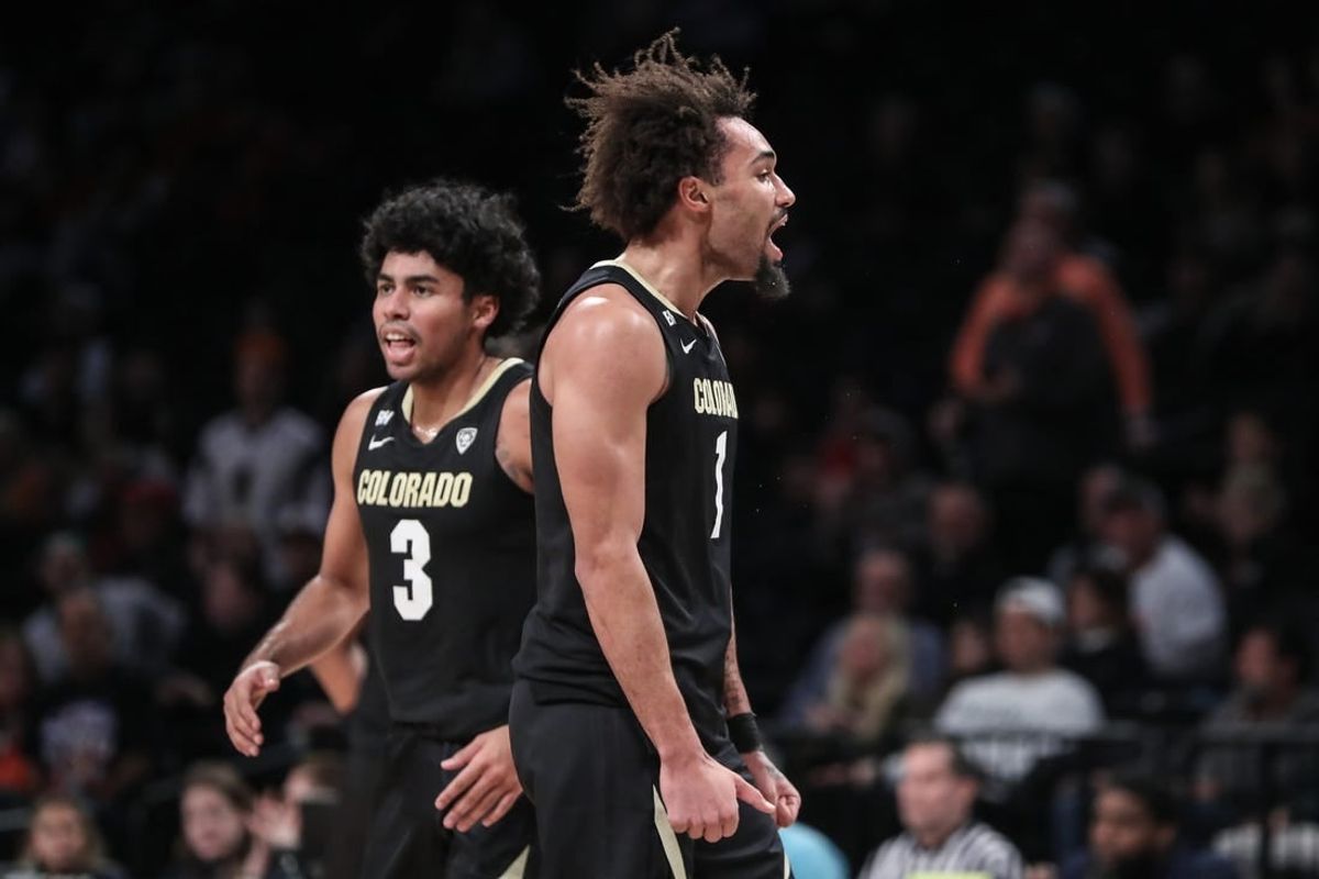 Dec 10, 2023; Brooklyn, New York, USA;  Colorado Buffaloes guard J'Vonne Hadley (1) celebrates after the Miami (Fl) Hurricanes call a timeout in the first half at Barclays Center.