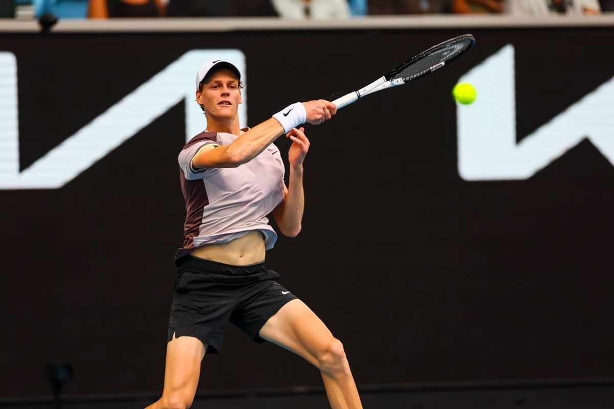 Jan 19, 2024; Melbourne, Victoria, Australia; Jannik Sinner of Italy plays a shot against Sebastian Baez (not pictured) of Argentina in Round 3 of the Men's Singles on Day 6 of the Australian Open tennis at Margaret Court Arena.