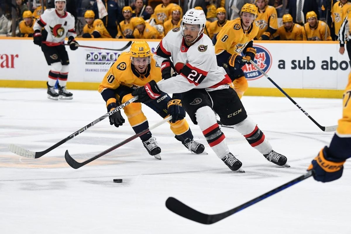 Feb 27, 2024; Nashville, Tennessee, USA; Ottawa Senators right wing Mathieu Joseph (21) handles the puck in the offensive zone during the second period against the Nashville Predators at Bridgestone Arena.