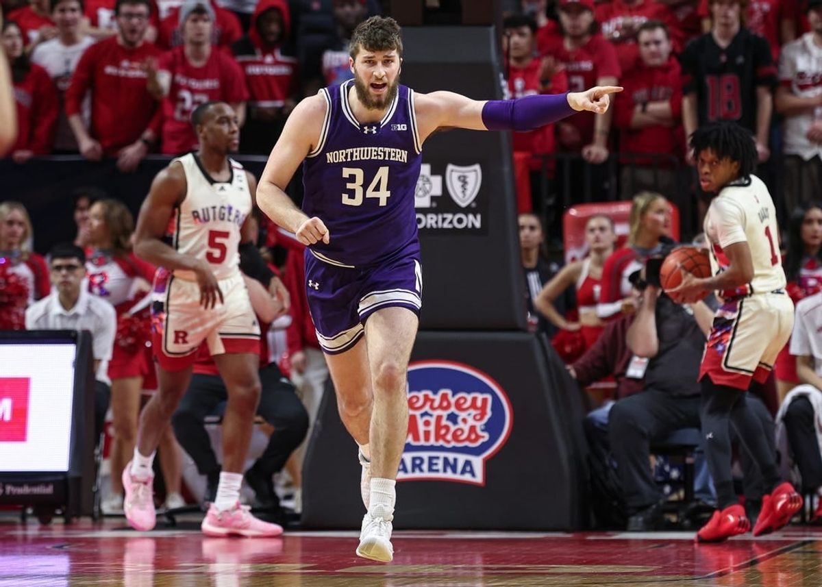 Feb 15, 2024; Piscataway, New Jersey, USA; Northwestern Wildcats center Matthew Nicholson (34) reacts after making a basket against the Rutgers Scarlet Knights during the second half at Jersey Mike's Arena.