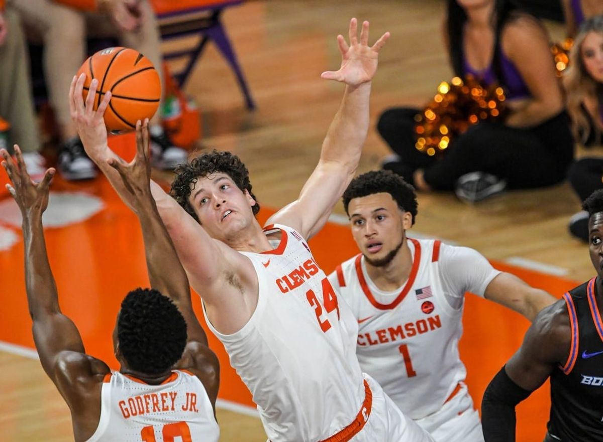Sunday, November 19, 2023; Clemson junior forward PJ Hall (24) rebounds against Boise State during the first half at Littlejohn Coliseum in Clemson, S.C. Sunday, November 19, 2023.