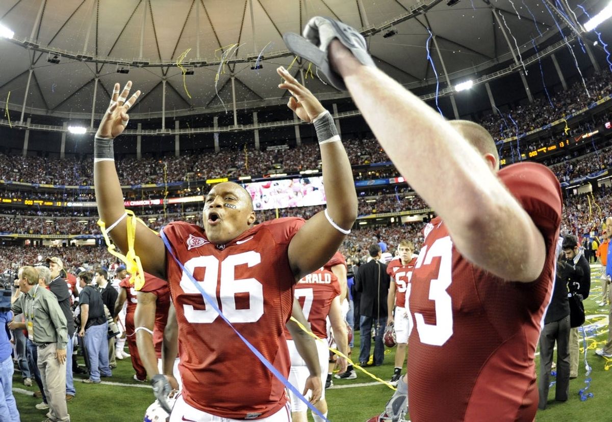 Dec 5, 2009; Atlanta, GA, USA; Alabama Crimson Tide defensive lineman Luther Davis (96) celebrates after defeating the Florida Gators 32-13 in the 2009 SEC championship game at the Georgia Dome.  Mandatory Credit: Dale Zanine-Imagn Images