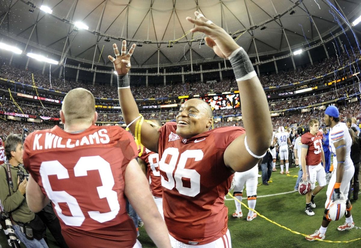 Dec 5, 2009; Atlanta, GA, USA; Alabama Crimson Tide defensive lineman Luther Davis (96) celebrates after defeating the Florida Gators 32-13 in the 2009 SEC championship game at the Georgia Dome.  Mandatory Credit: Dale Zanine-Imagn Images