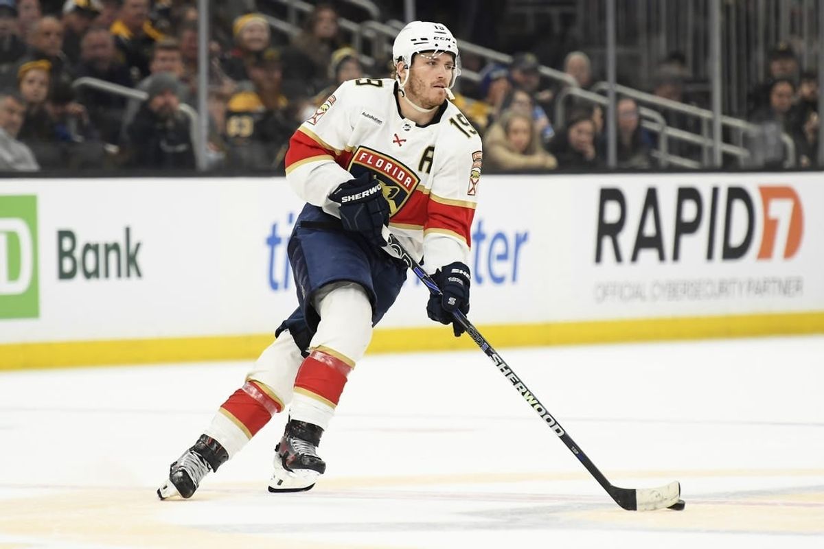 Apr 6, 2024; Boston, Massachusetts, USA; Florida Panthers left wing Matthew Tkachuk (19) skates with the puck during overtime against the Boston Bruins at TD Garden.