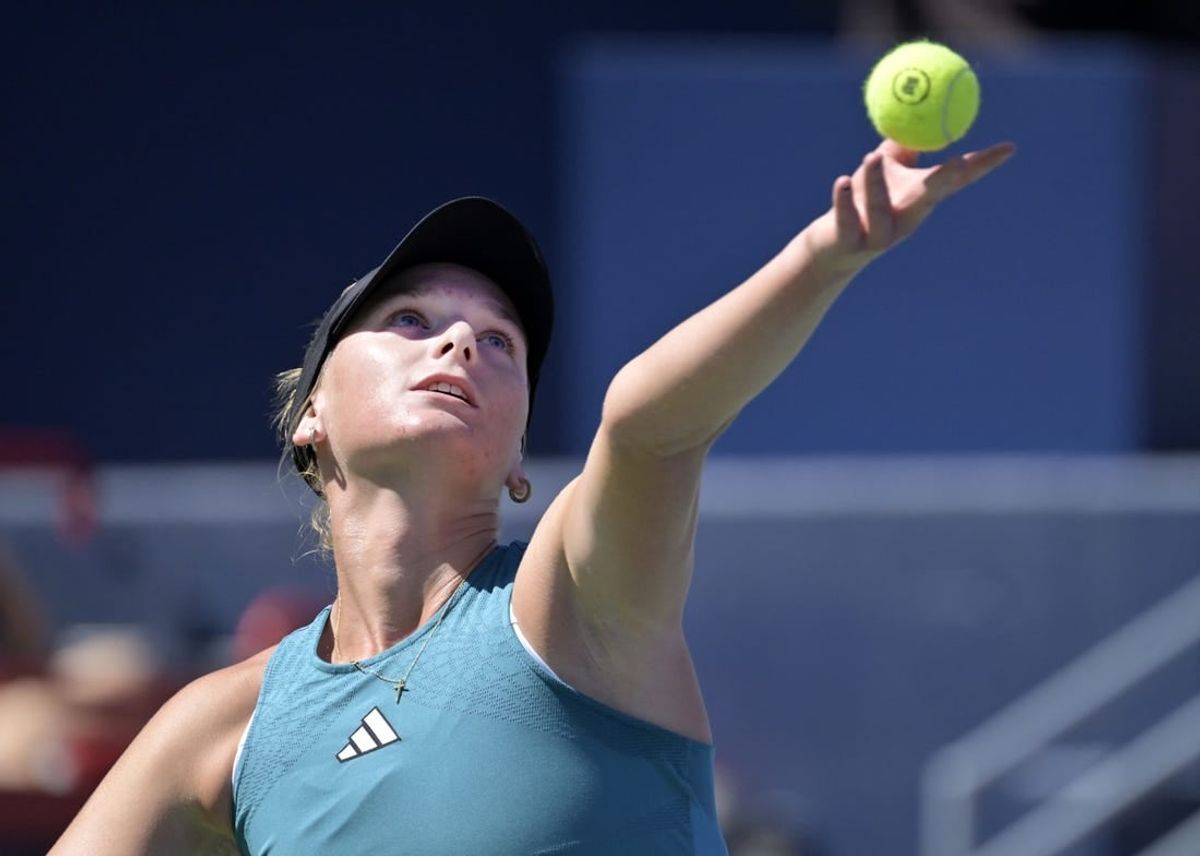 Aug 6, 2023; Montreal, Quebec, Canada; Ashlyn Krueger (USA) serves against Camila Giorgi (ITA) (not pictured) in second round qualifying play at IGA Stadium.